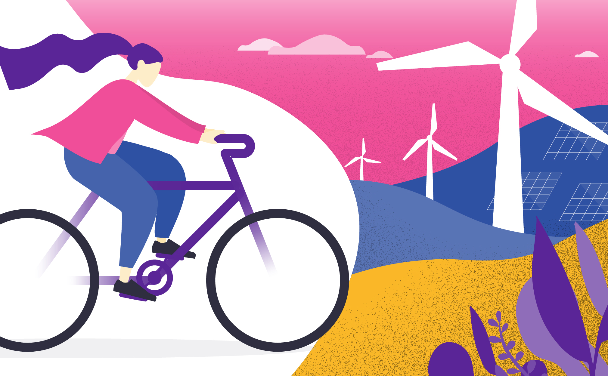 Woman cycling past windmills